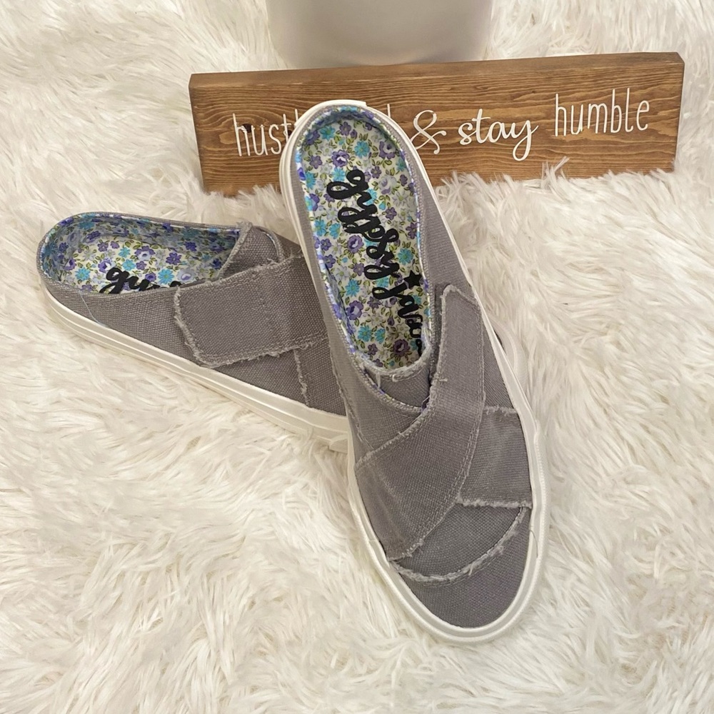 Gray slip on sneakers with adjustable strap